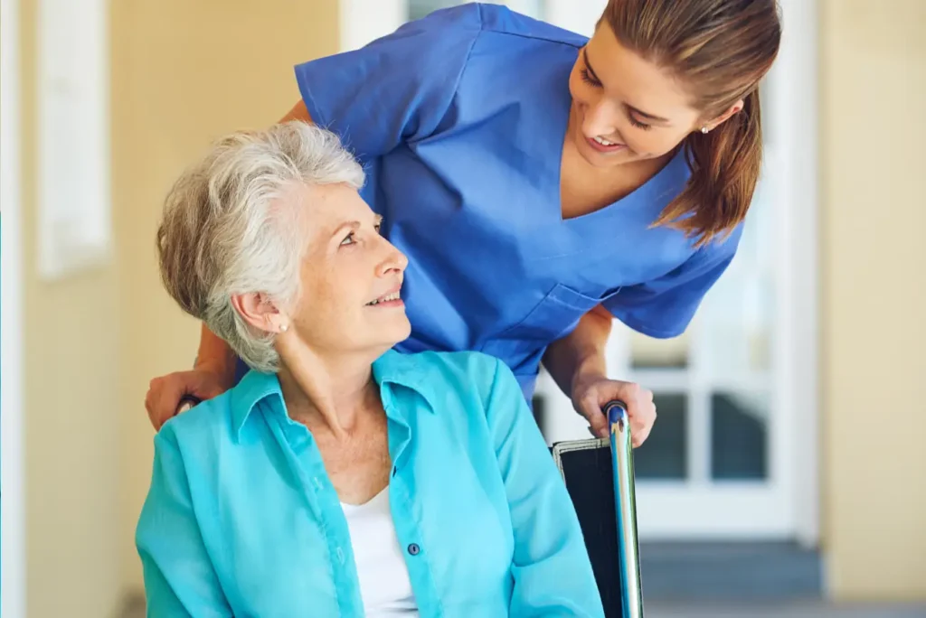 Smiling caregiver sharing a joyful moment with elderly client during home care visit in Swindon