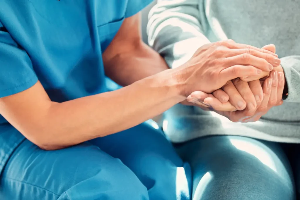 Compassionate caregiver supporting elderly client with daily living at home in Truro & Swindon