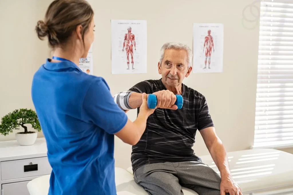 Elderly patient receiving gentle physiotherapy at home in Truro & Swindon – personalised mobility support
