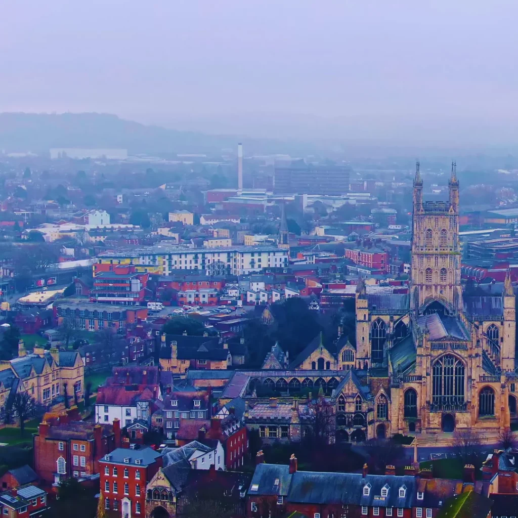 Aerial view of Gloucester with the cathedral in the foreground, representing local home care services